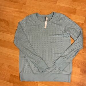 Lululemon shirt with long sleeve, size 6, color light turquoise.